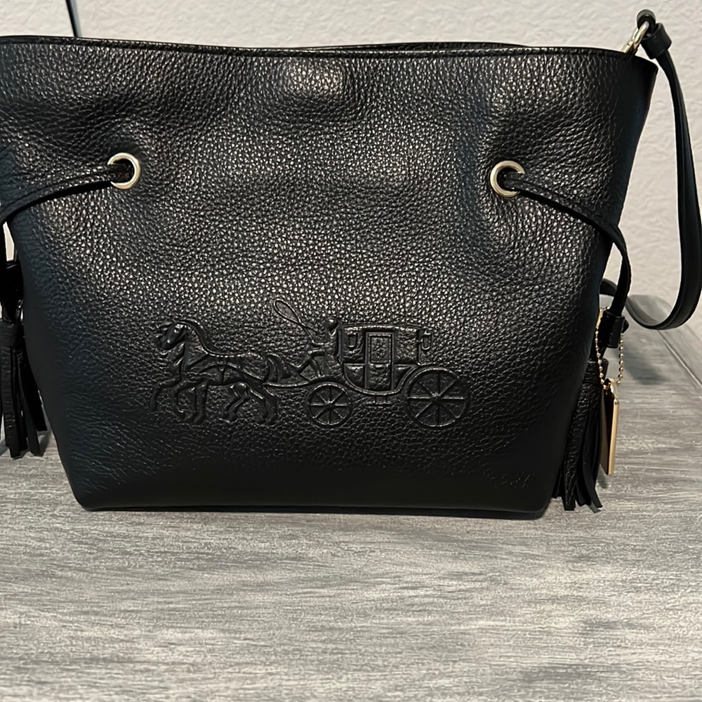 Leather coach crossbody with signature horse and carriage